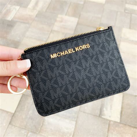 michael kors change purse black|Michael Kors price adjustment.